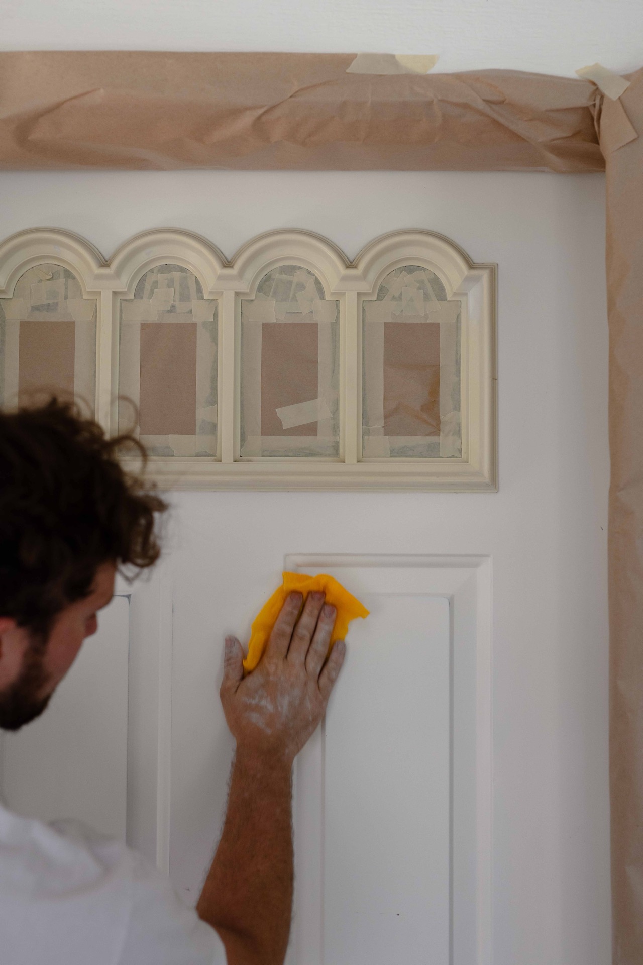 Detail work on a freshly painted interior door at a Hayden, ID home